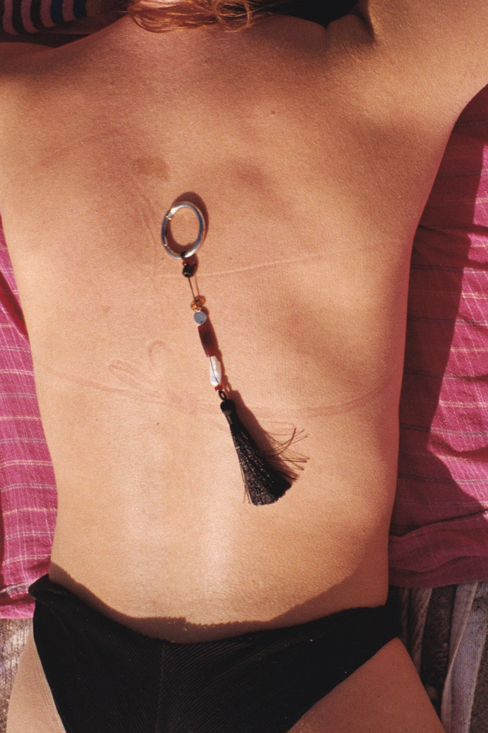 TASSEL CHARM