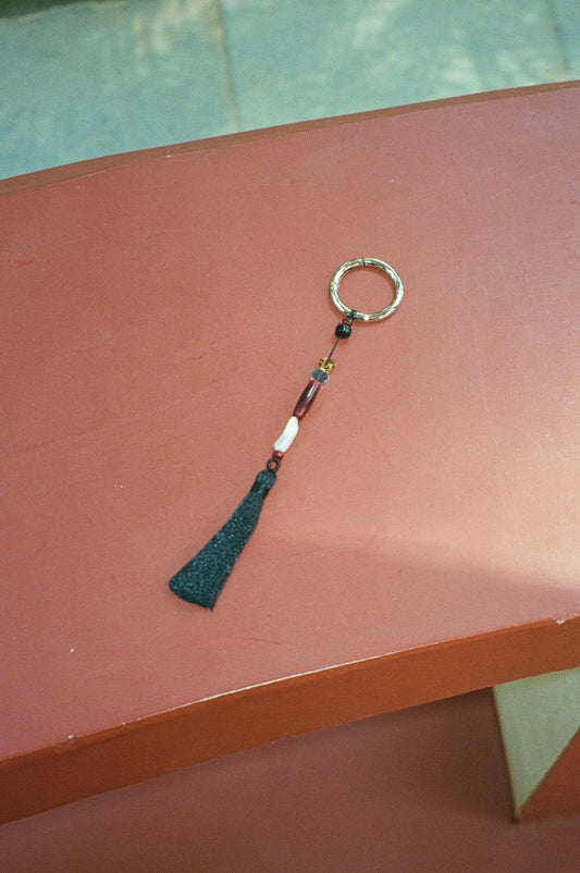 TASSEL CHARM
