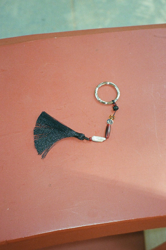 TASSEL CHARM