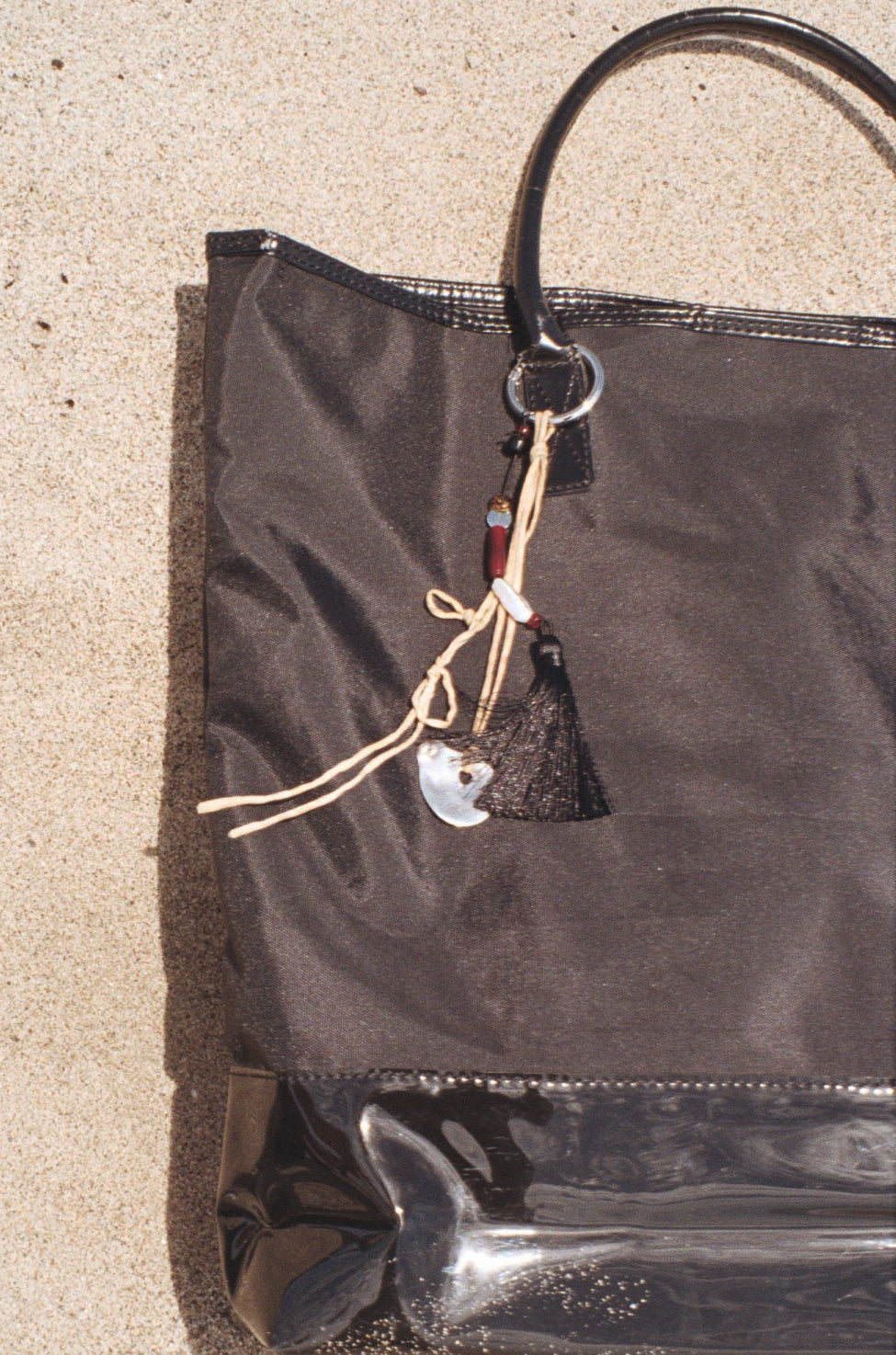 TASSEL CHARM
